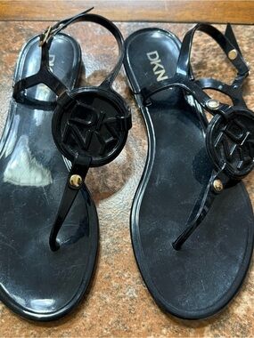 DKNY Black Logo T-Strap Jelly Sandals with Gold Accents  Size 6